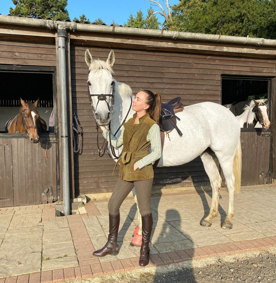 Eliza Manners wears British Made Suede Gilet in Olive